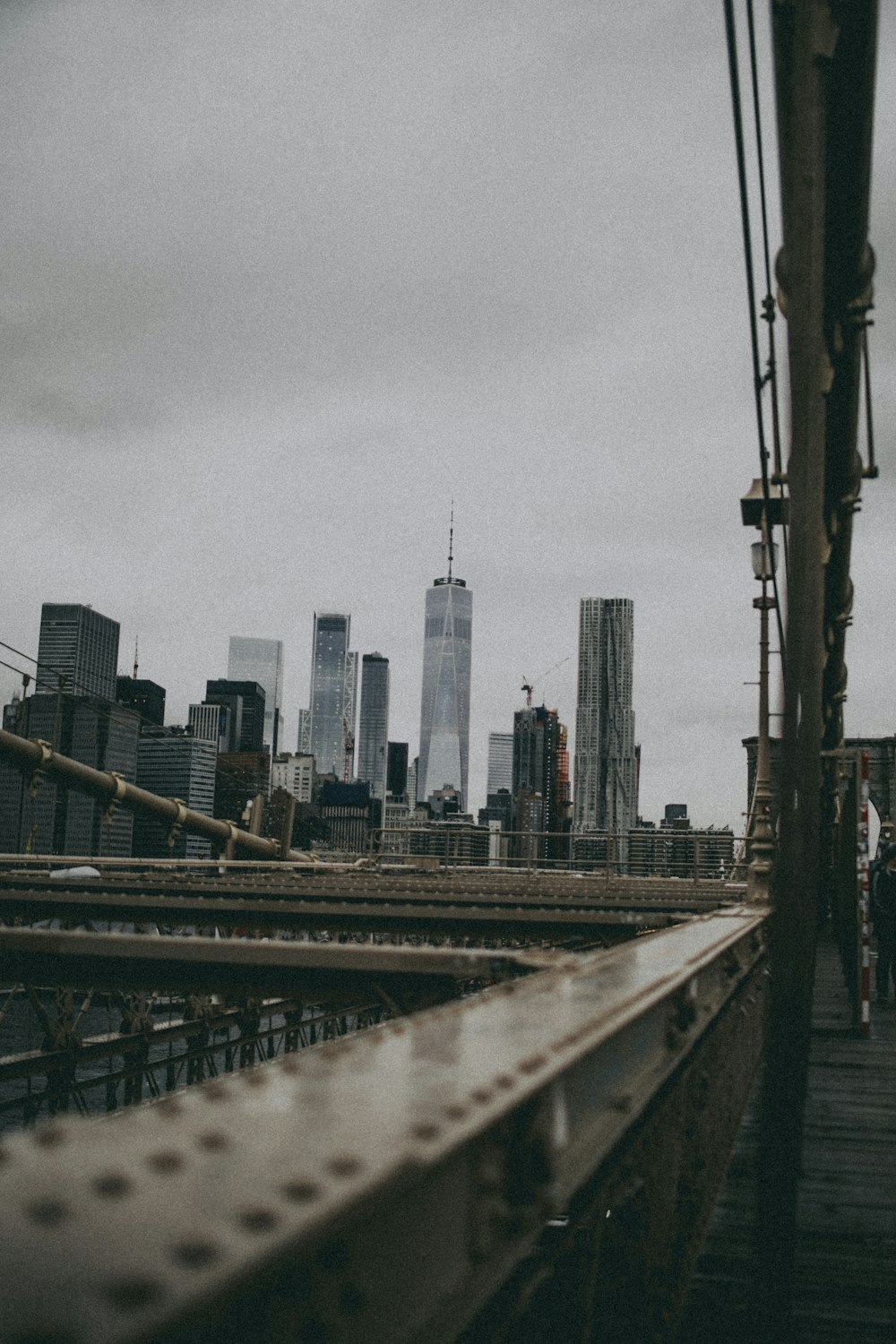 bridge near buildings during day