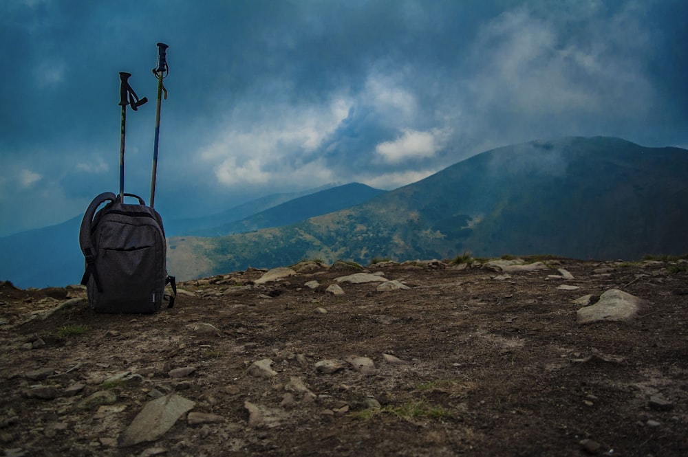 gray backpack on high ground