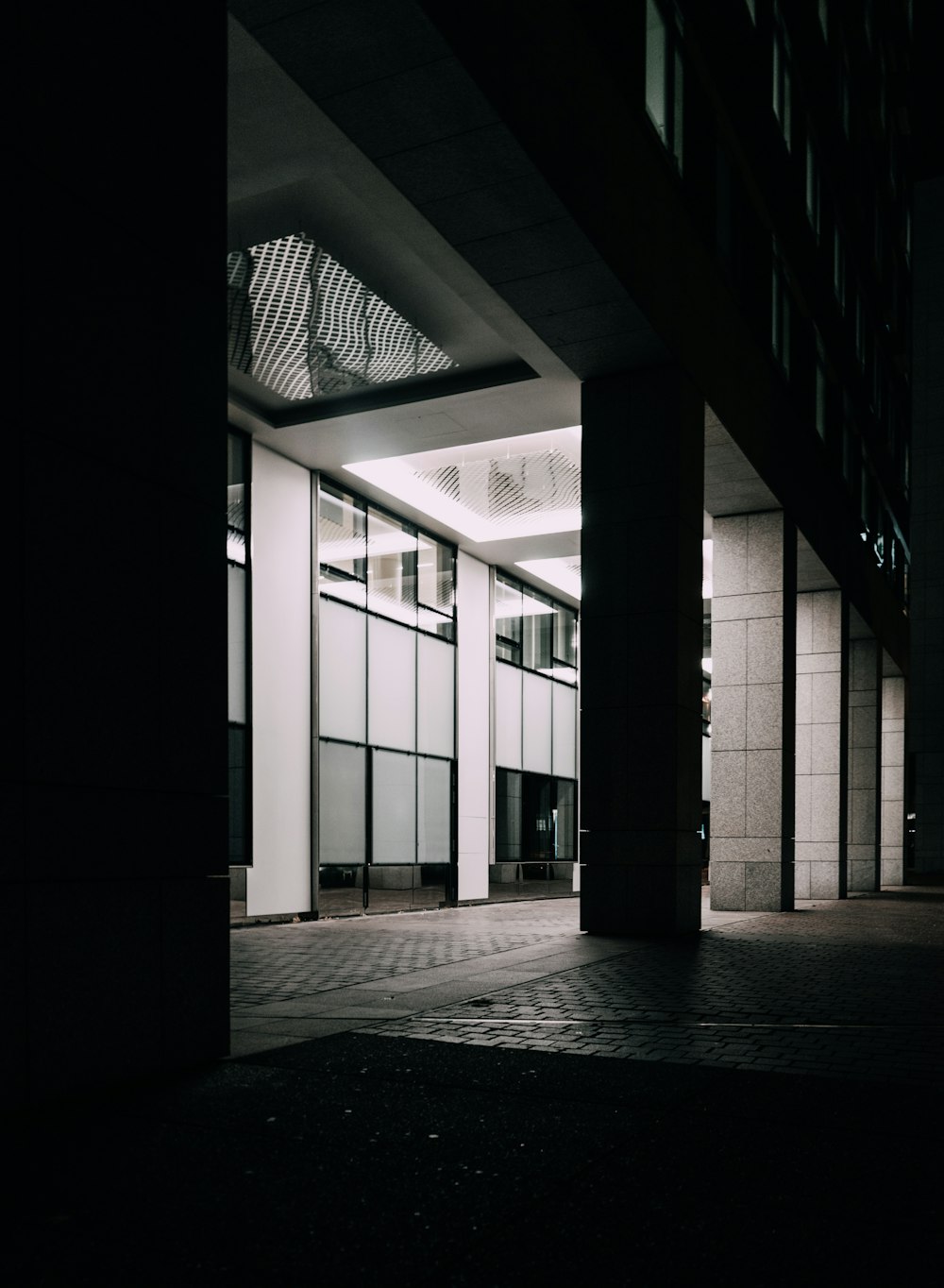 grayscale photography of concrete building