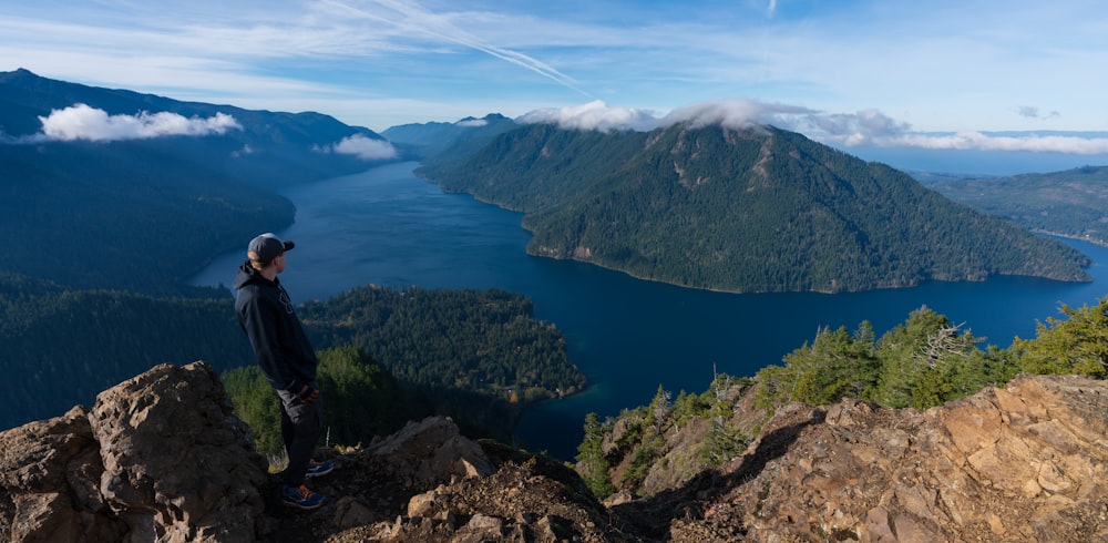 man standing on cliff