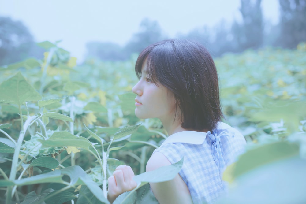 woman surrounded by plants