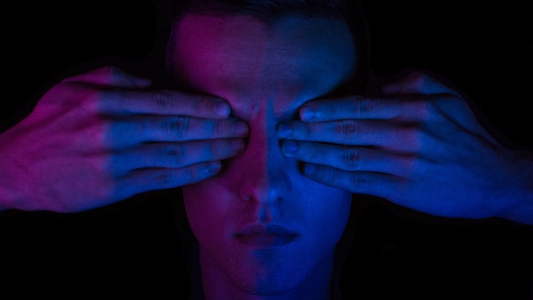 person covering his eyes wallpaper,