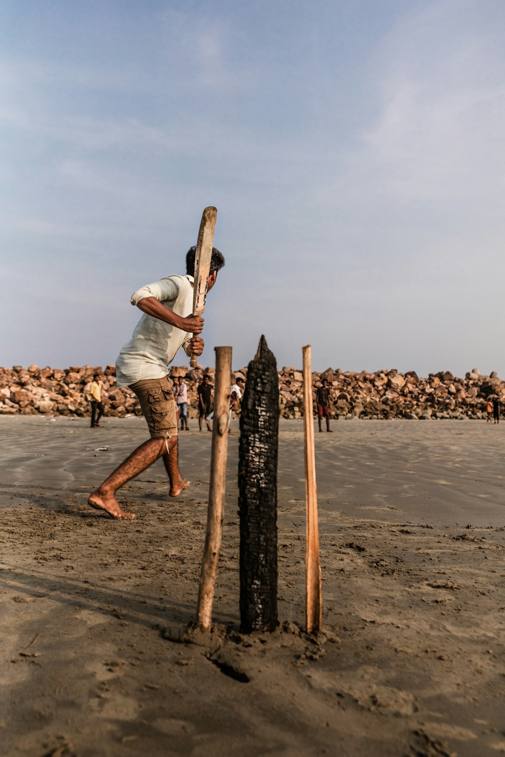 person holding cricket bat