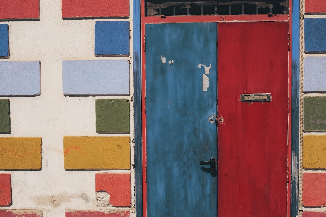 closed blue and red door,