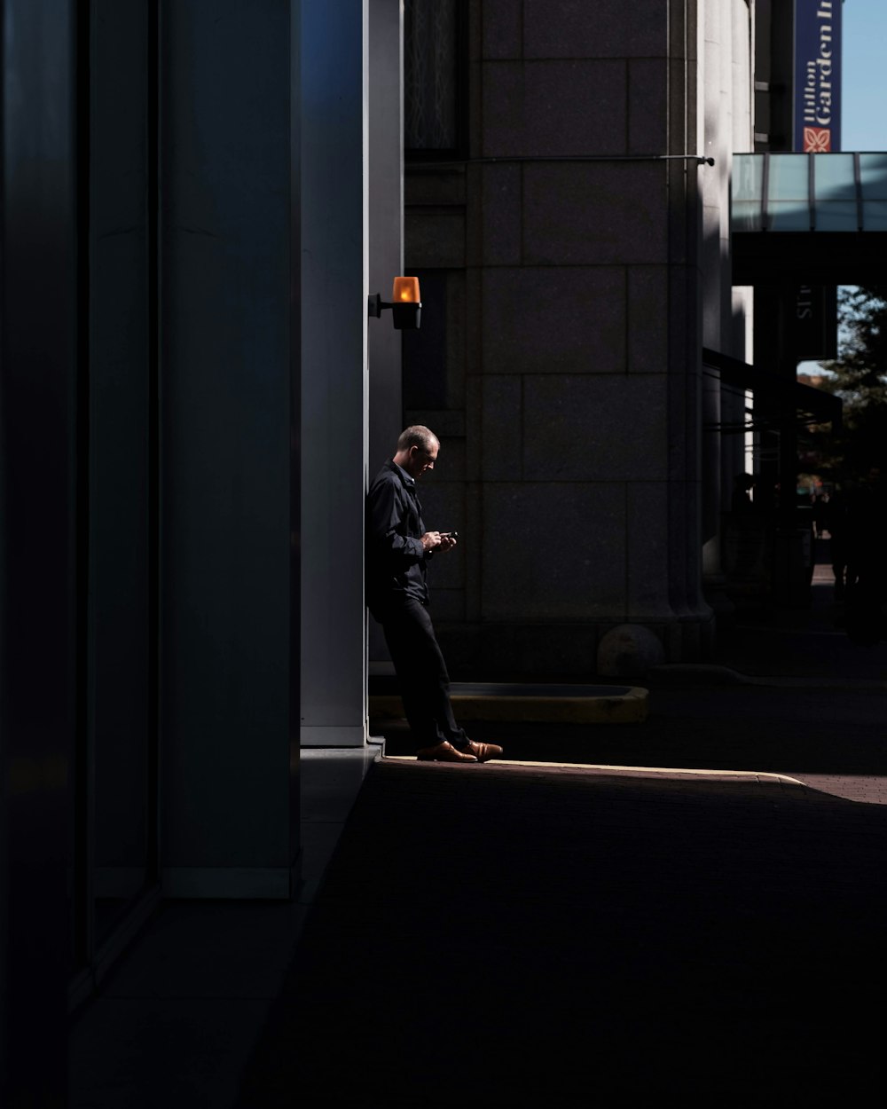 man standing near wall