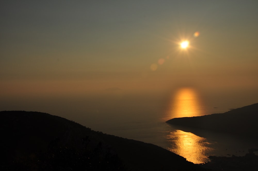 ocean and island during golden hour