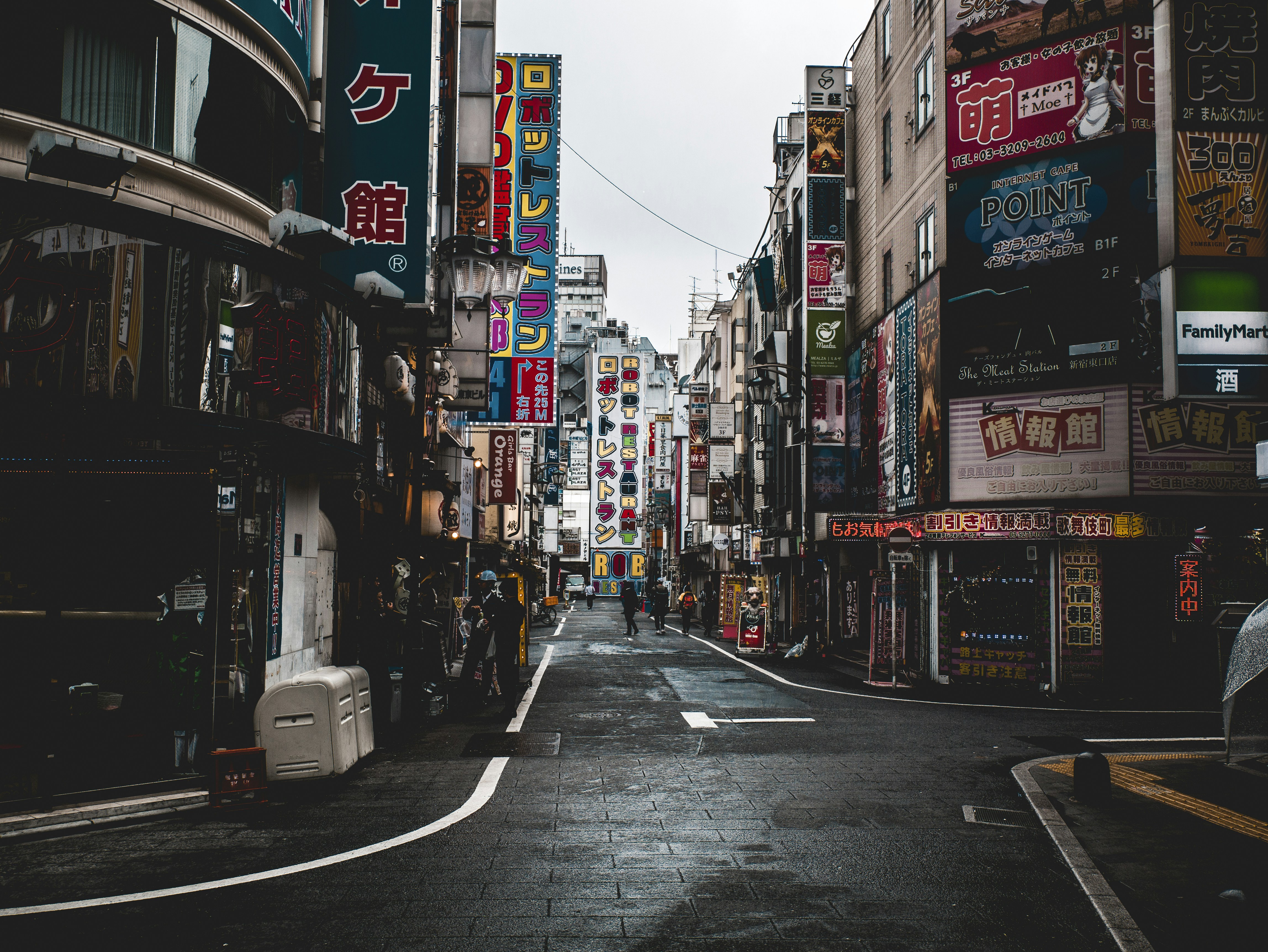 people on street surrounded by buildings during daytime, 