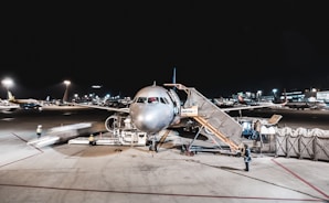 Aircraft personnel doing maintenance. 