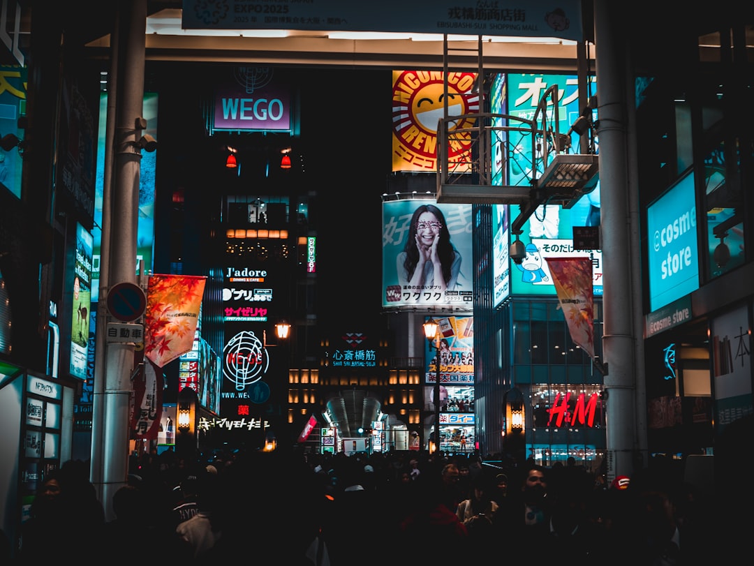 people walking on streets at nighttime,