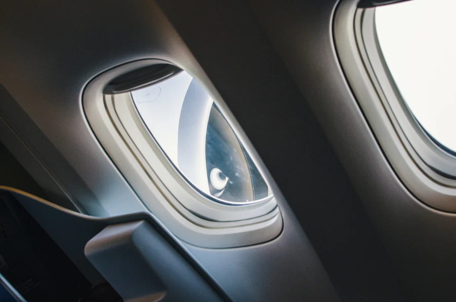 Traveller looking out of an aircraft window