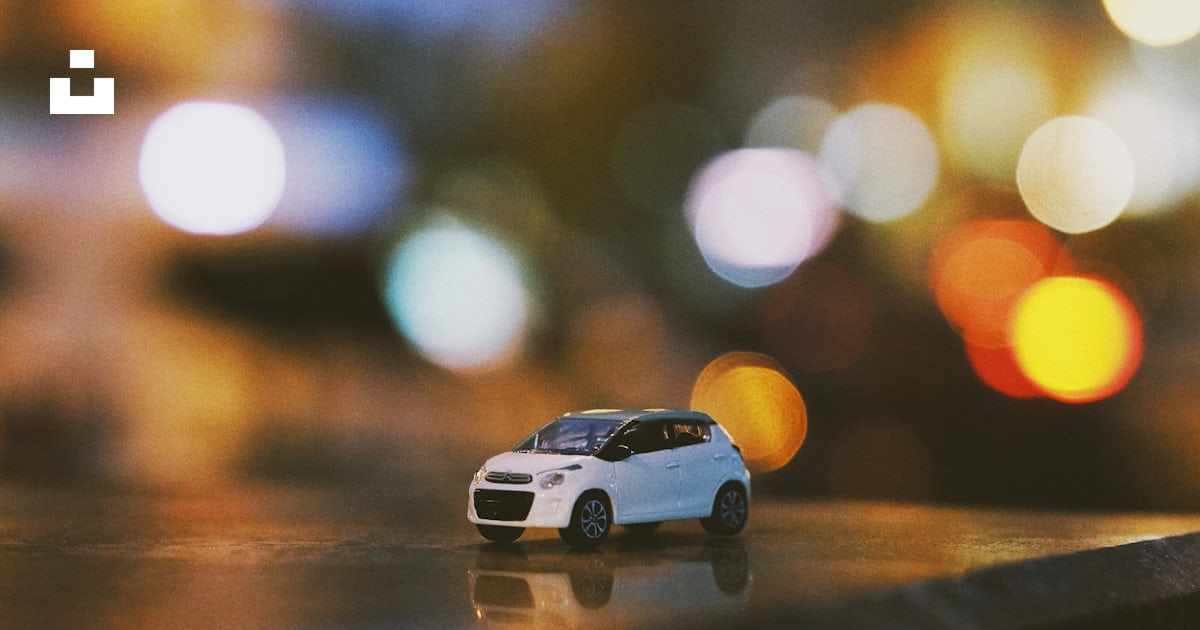Bokeh photography of white car miniature photo – Free Car Image on Unsplash