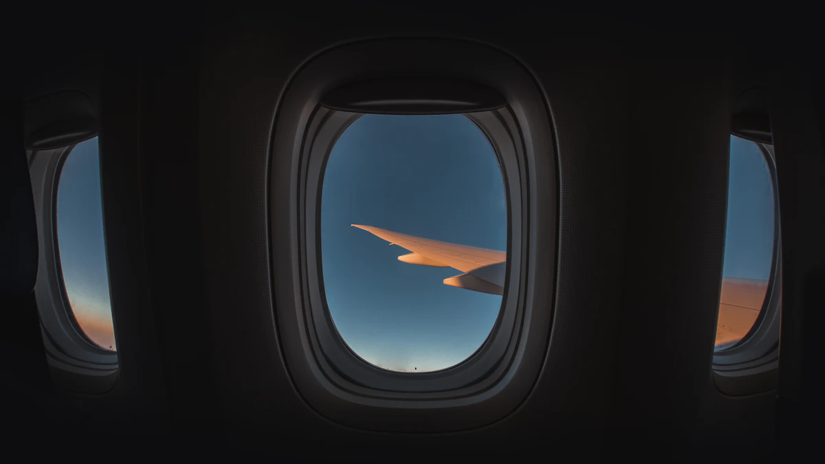Commercial jet wing against the sky in flight