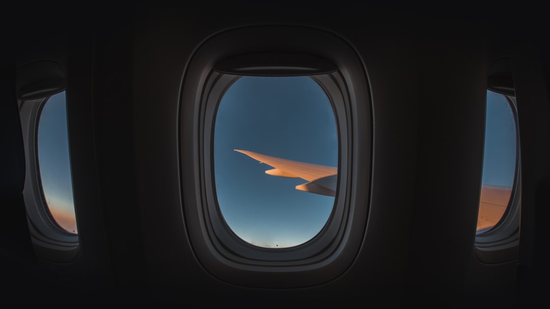 opened airplane window,