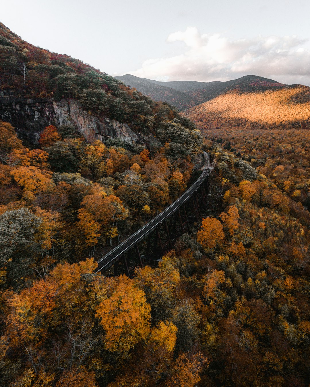 Follow me on Instagram @jevanleith for my latest content!

Here is a wide angle view of the Frankenstein Trestle in Crawford Notch of the White Mountains of NH. This was a bit past peak foliage, but still a great scene!