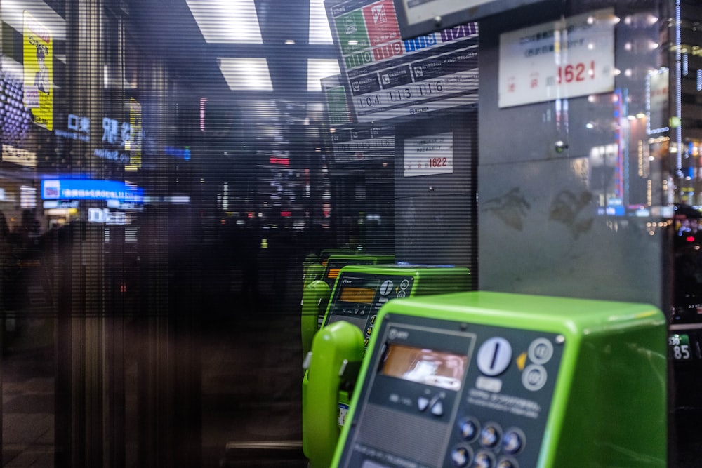 green coin operated telephone