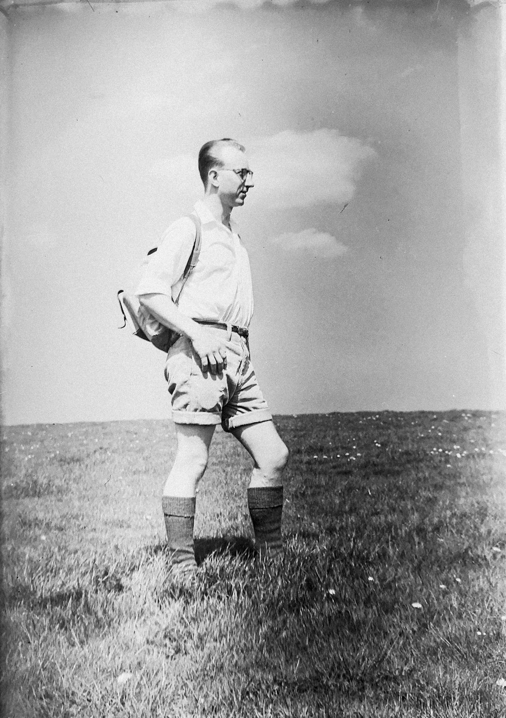 man standing on field photo