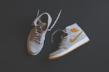 grey-and-white Air Jordan 1's