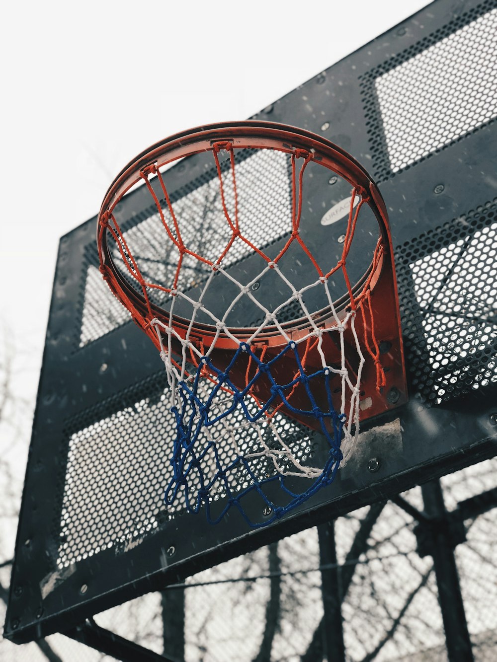 black and red outdoor basketball hoop