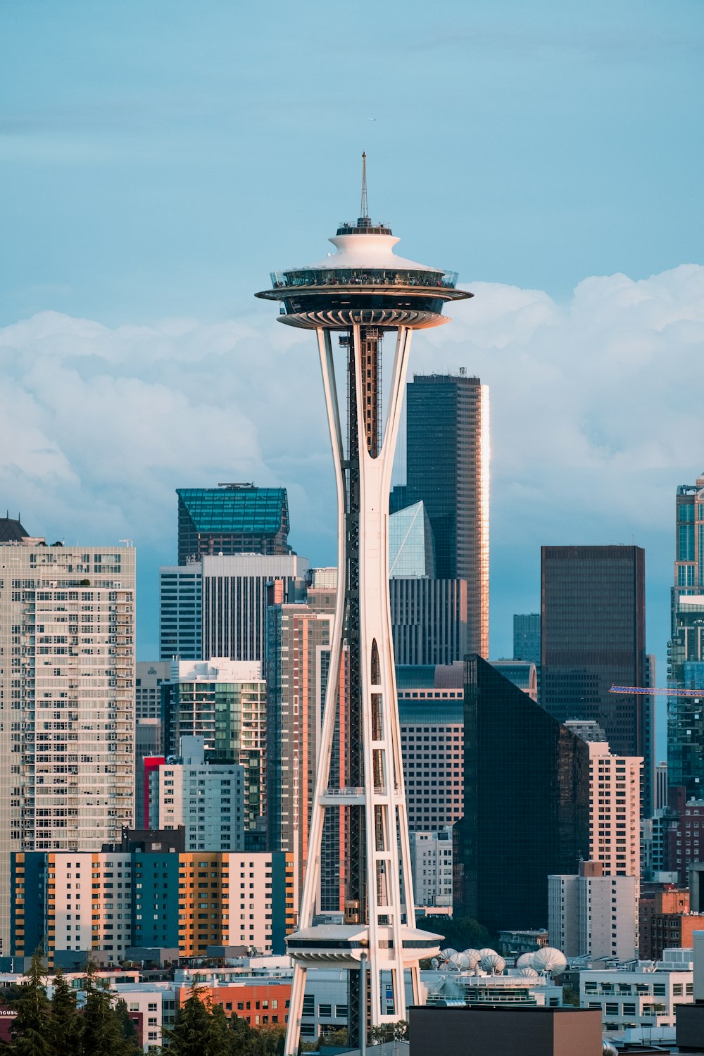 Space Needle near buildings at daytime