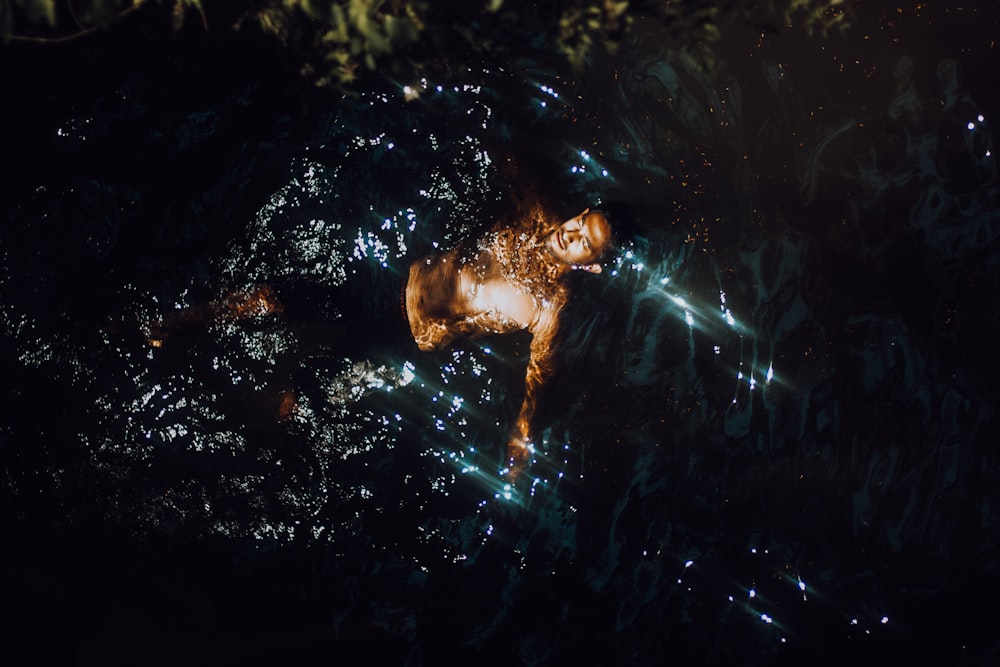 aerial photography of man in water