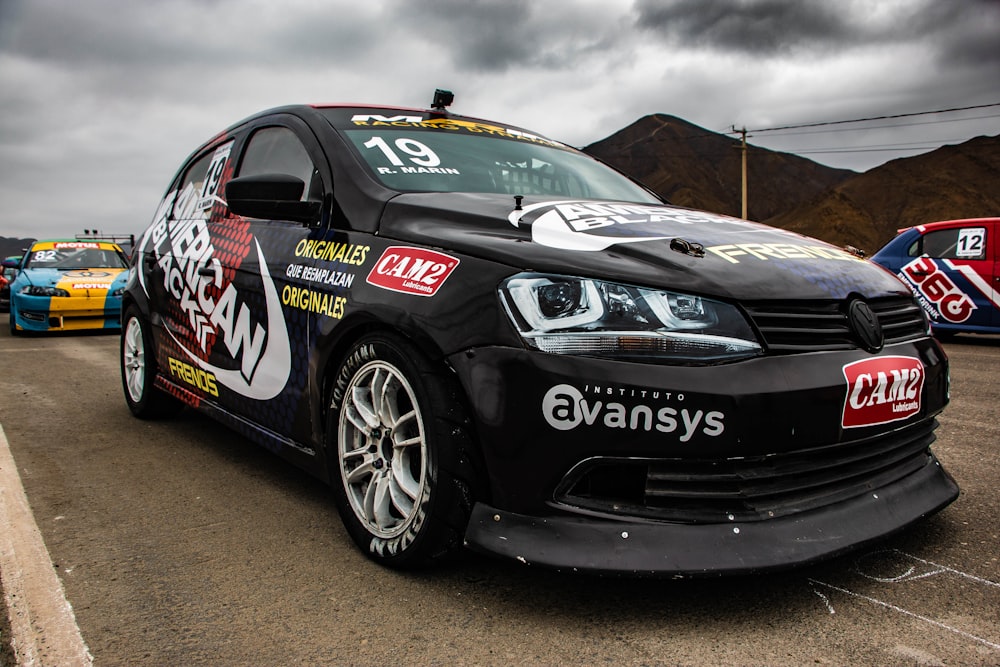 black Volkswagen sedan on race track