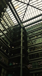 Architect reviewing renovation plans inside a modern office.