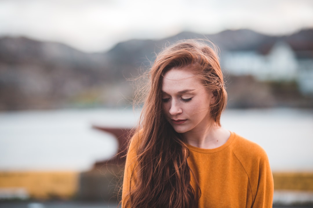 woman near body of water