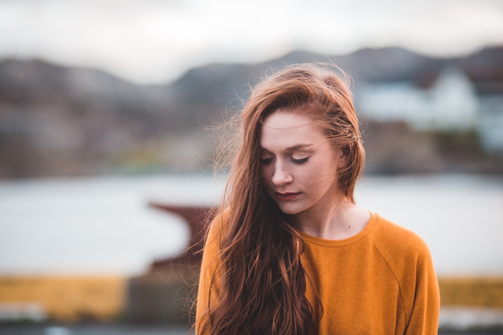 woman near body of water