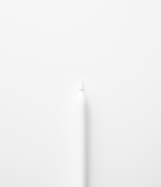 a white toothbrush on a white surface