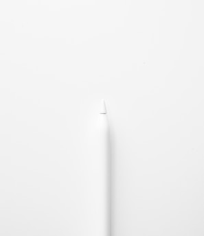 a white toothbrush on a white surface