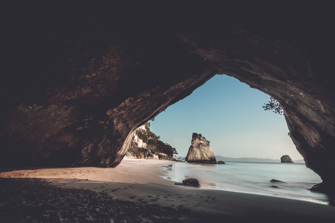 rock formation near water, Sunrise at Cathedral Cove