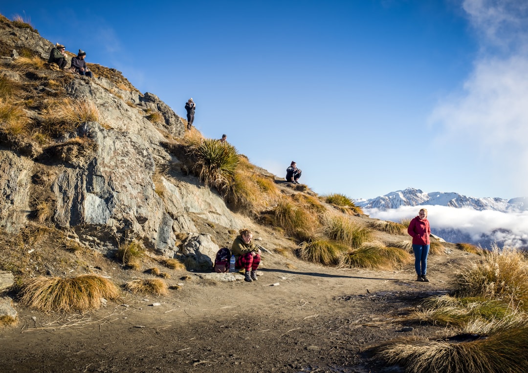 people on hill,