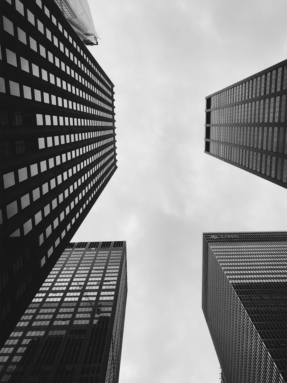 low-angle photograph of concrete structures