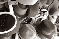 A collection of hats arranged artistically.