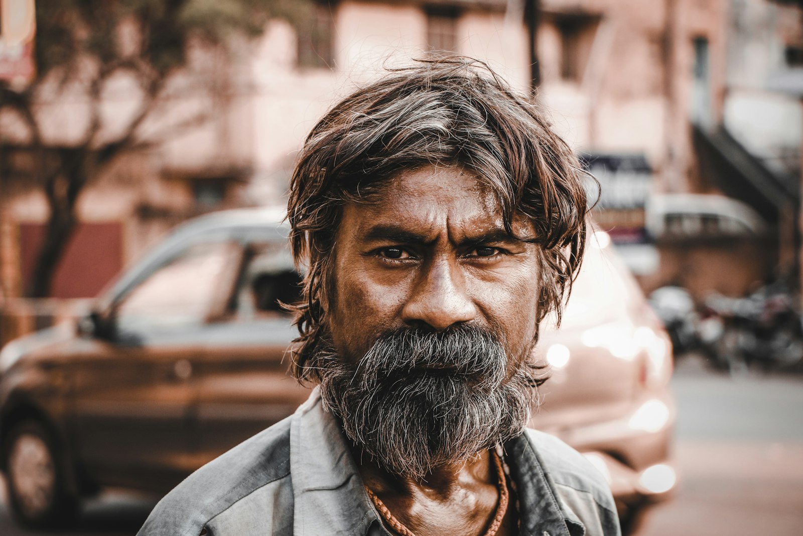 Canon EOS 70D sample photo. Man standing near parked photography