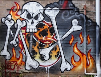 Graffiti art of a pirate radio theme on a brick wall.