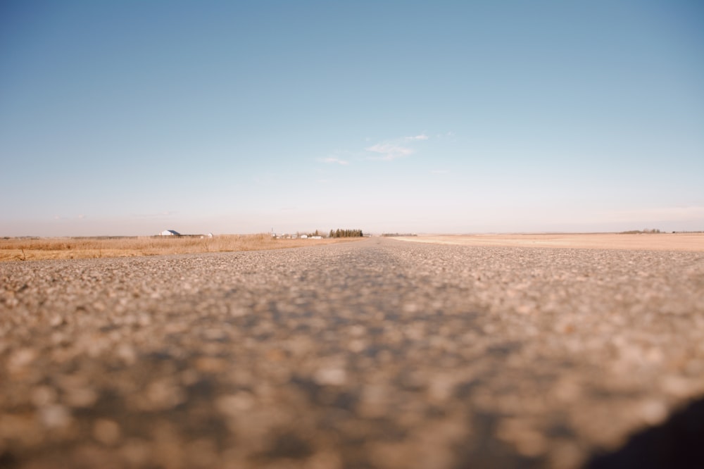 brown concrete road during daytime