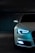 white vehicle with blue neon headlight bulb