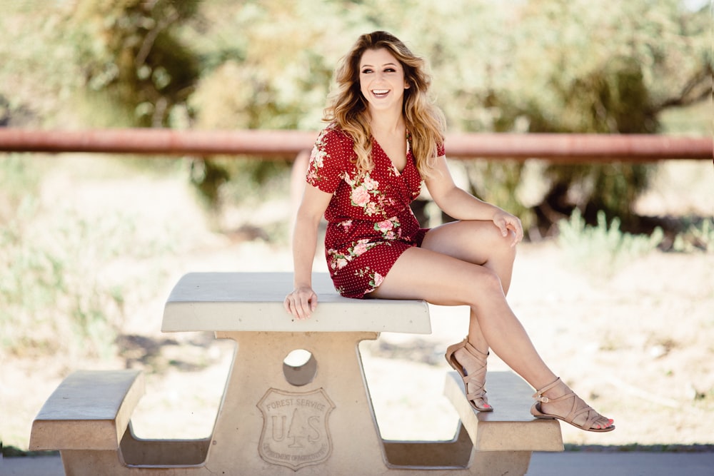 woman sitting on table