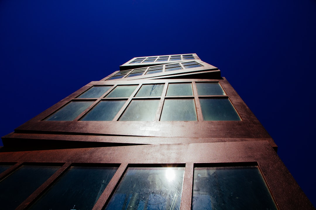 low-angle photography of brown building