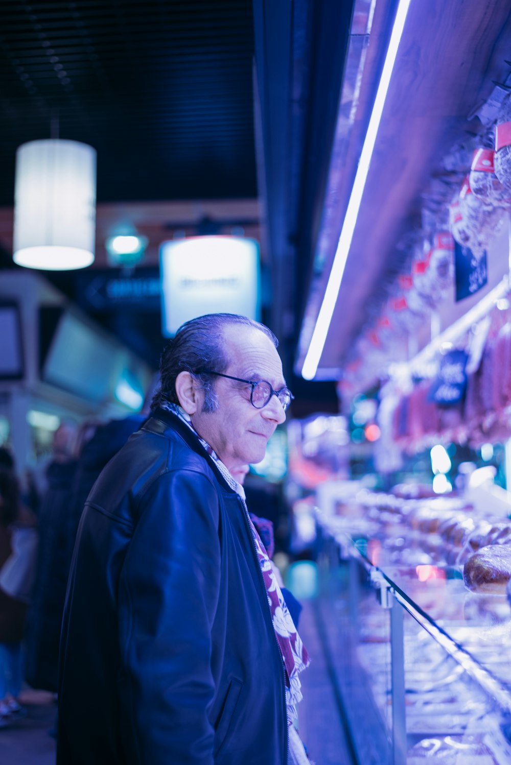 man looking at items