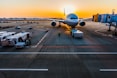 gray airplane on parking