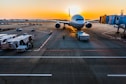 gray airplane on parking