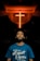 A man gazes upwards, standing below a prominently lit neon cross in a dimly lit environment. He wears a blue shirt with a spiritual quote printed on it.