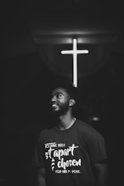 gray scale photography of man smiling