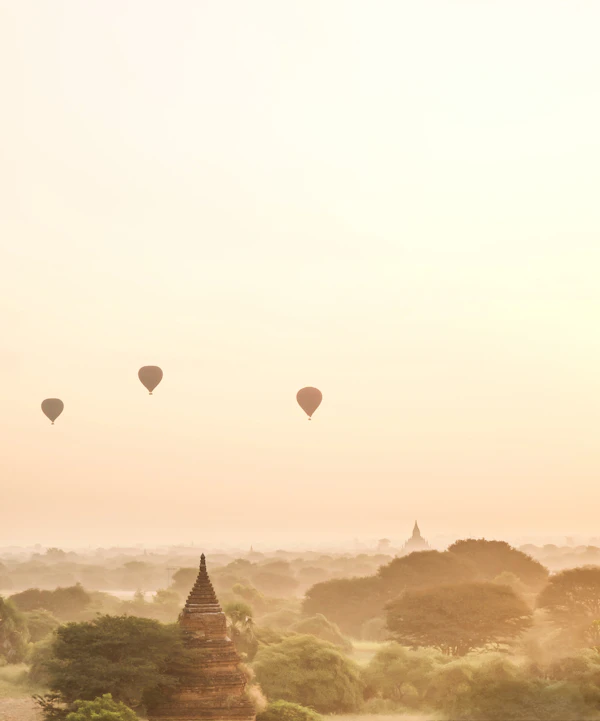 Silhouette of hot air balloons over Bagan at sunrise