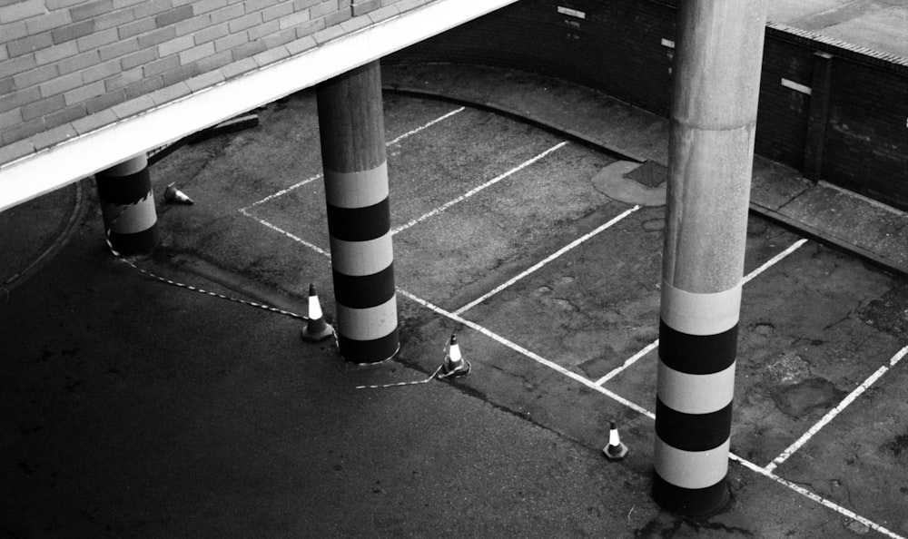 grayscale photography of building pillars