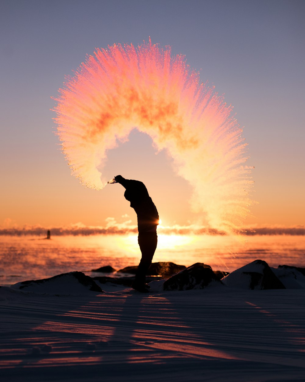 person throwing dust