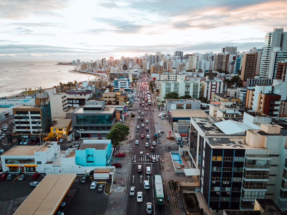 aerial photography of vehicles on road near buildings during daytime