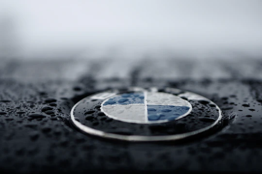 shallow focus photo BMW logo